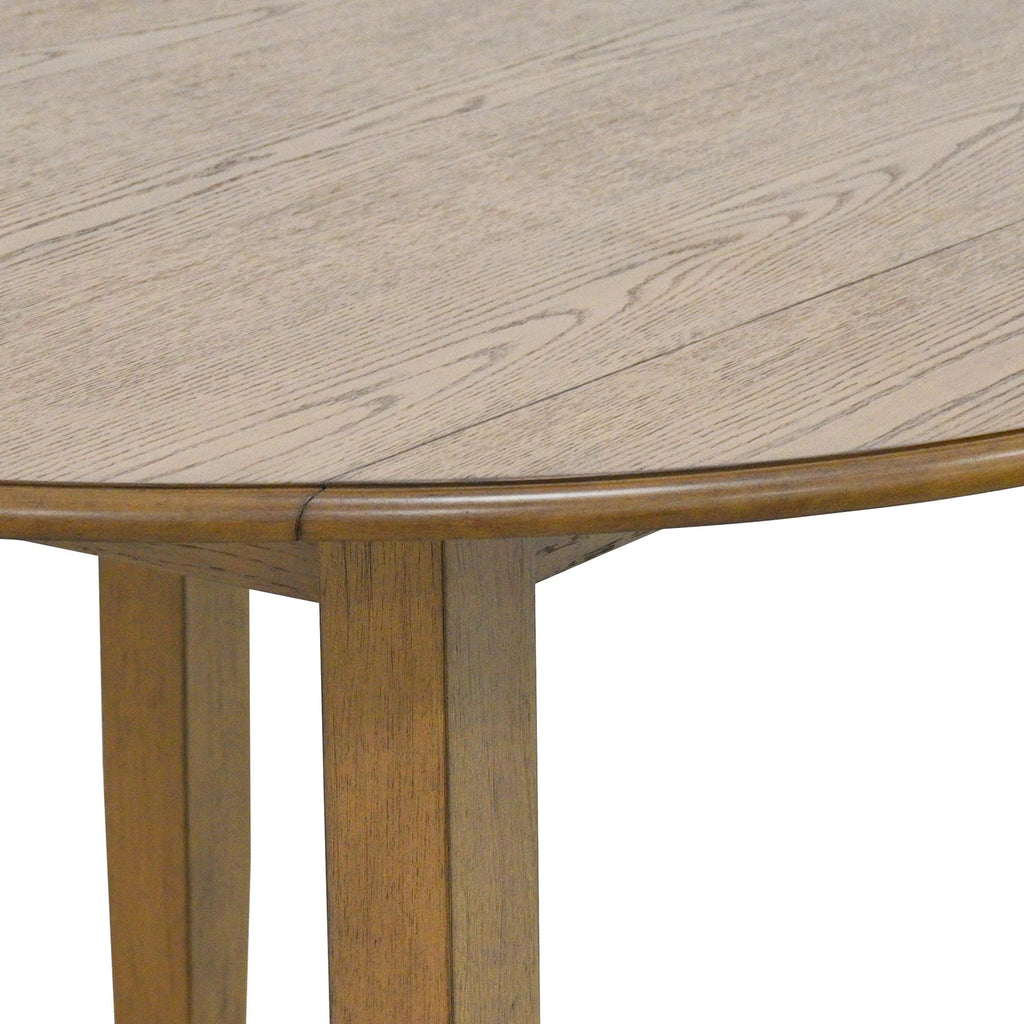 Conrad Round Dining Table in Walnut