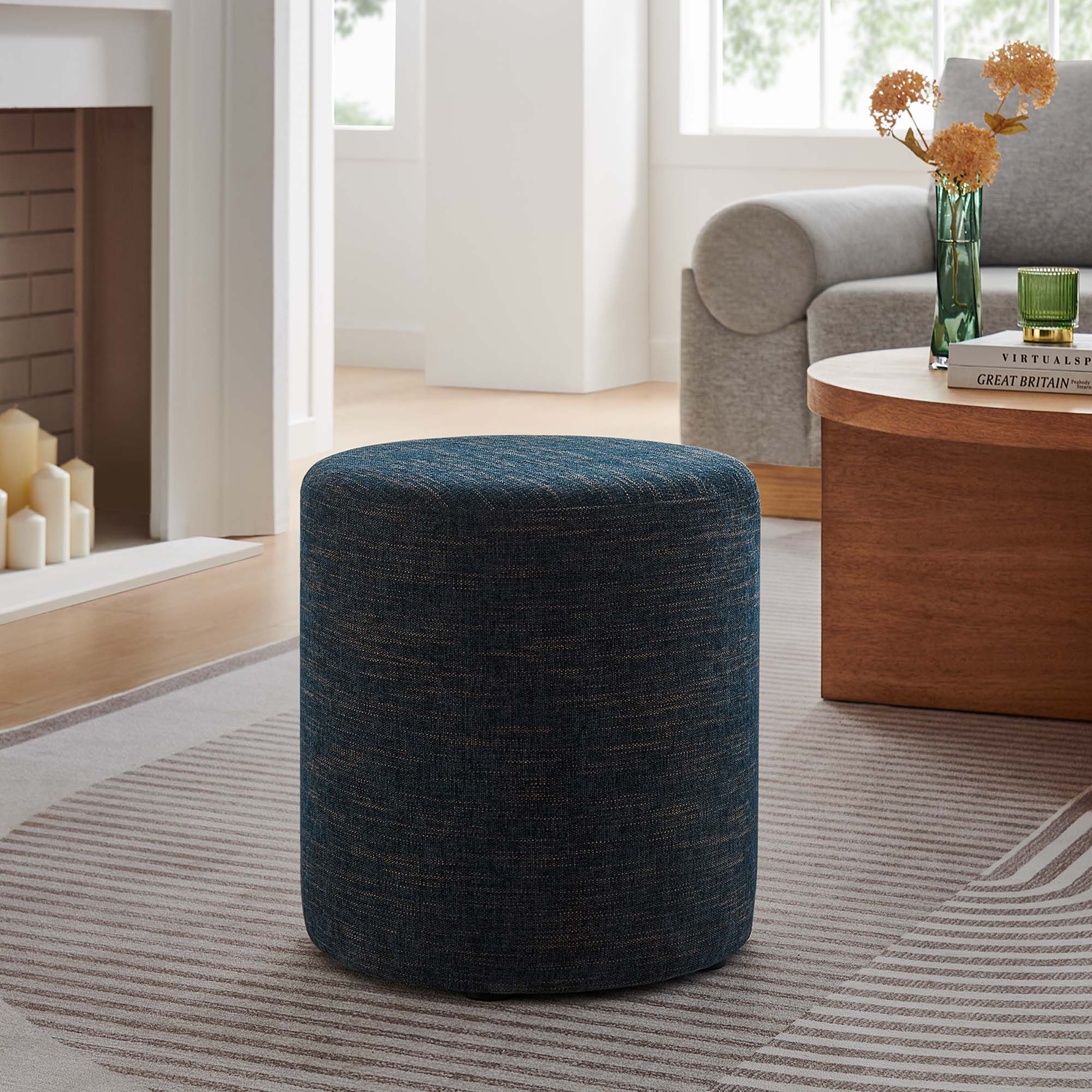 Callum 16" Round Woven Heathered Fabric Upholstered Ottoman in Heathered Weave