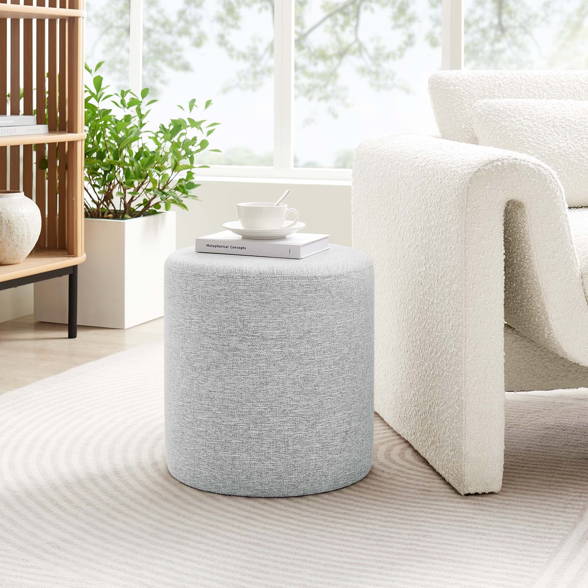Callum 16" Round Woven Heathered Fabric Upholstered Ottoman in Heathered Weave